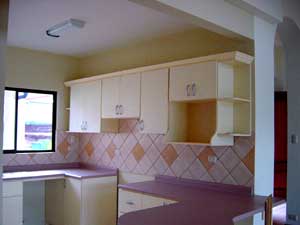 The kitchens have much cupboard and counter space.